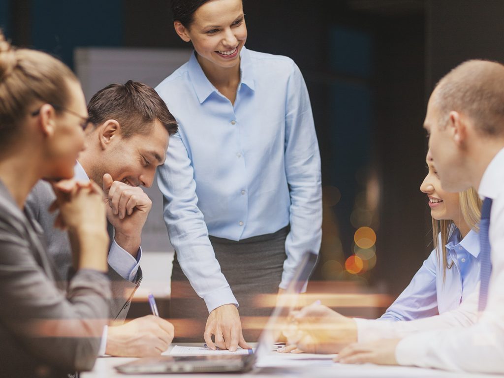 Woman leading a group of coworkers